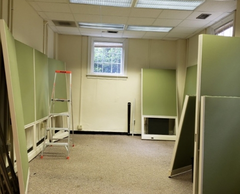 The lab space open, with only a few pieces of cubicles left around the edges