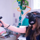 Maggie Melo using a VR Headset in the EiTM Lab