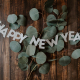 new years sign on leaves